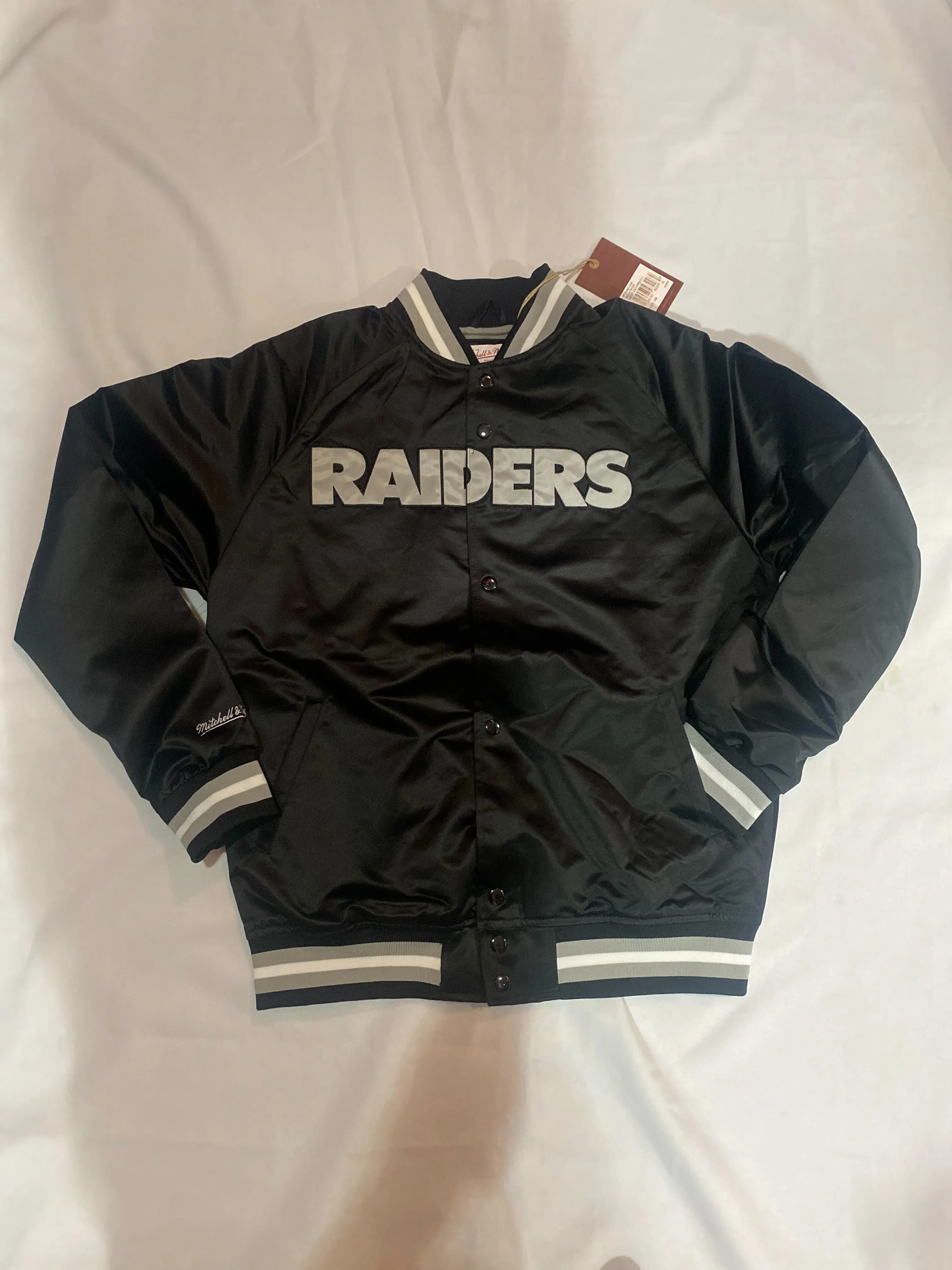 Las Vegas Raiders NFL Mitchell & Ness Lightweight Satin Men’s Jacket With Team Logo on the Back